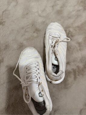 Nike Women’s White Athletic Sneakers with Gold Accents